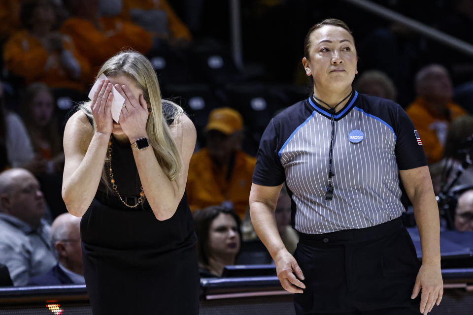 Tennessee head coach Kellie Harper, left, reacts after a call in the first half of a second-round college basketball game against Toledo in the NCAA Tournament, Monday, March 20, 2023, in Knoxville, Tenn. (AP Photo/Wade Payne)