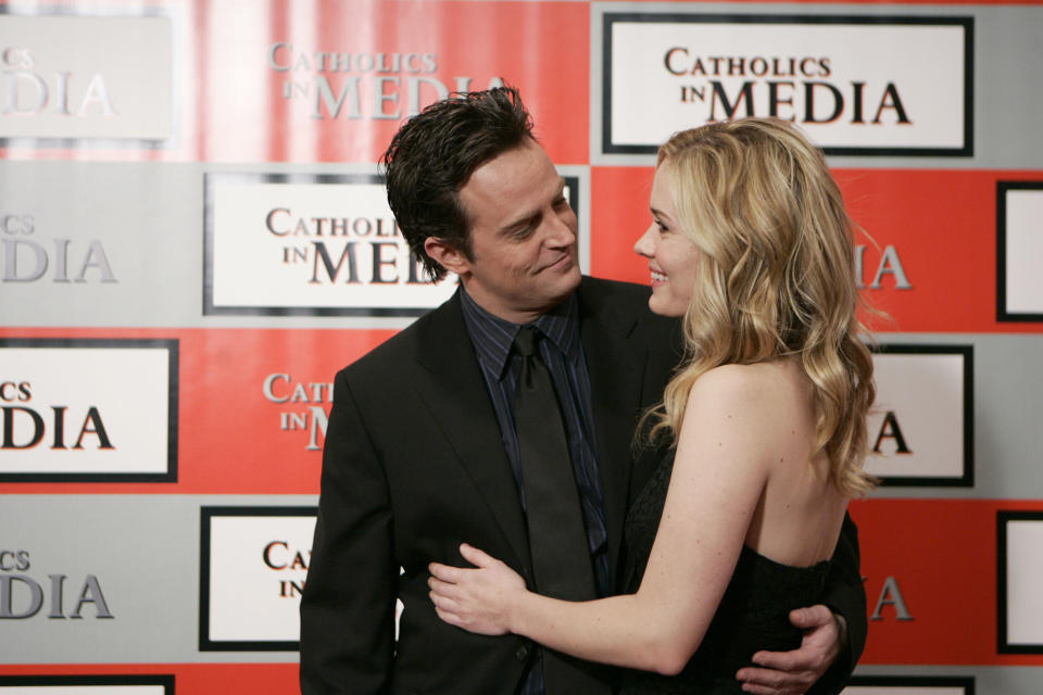 Matthew Perry and Sarah Paulson embrace in this still image from "Studio 60 on The Sunset Strip"