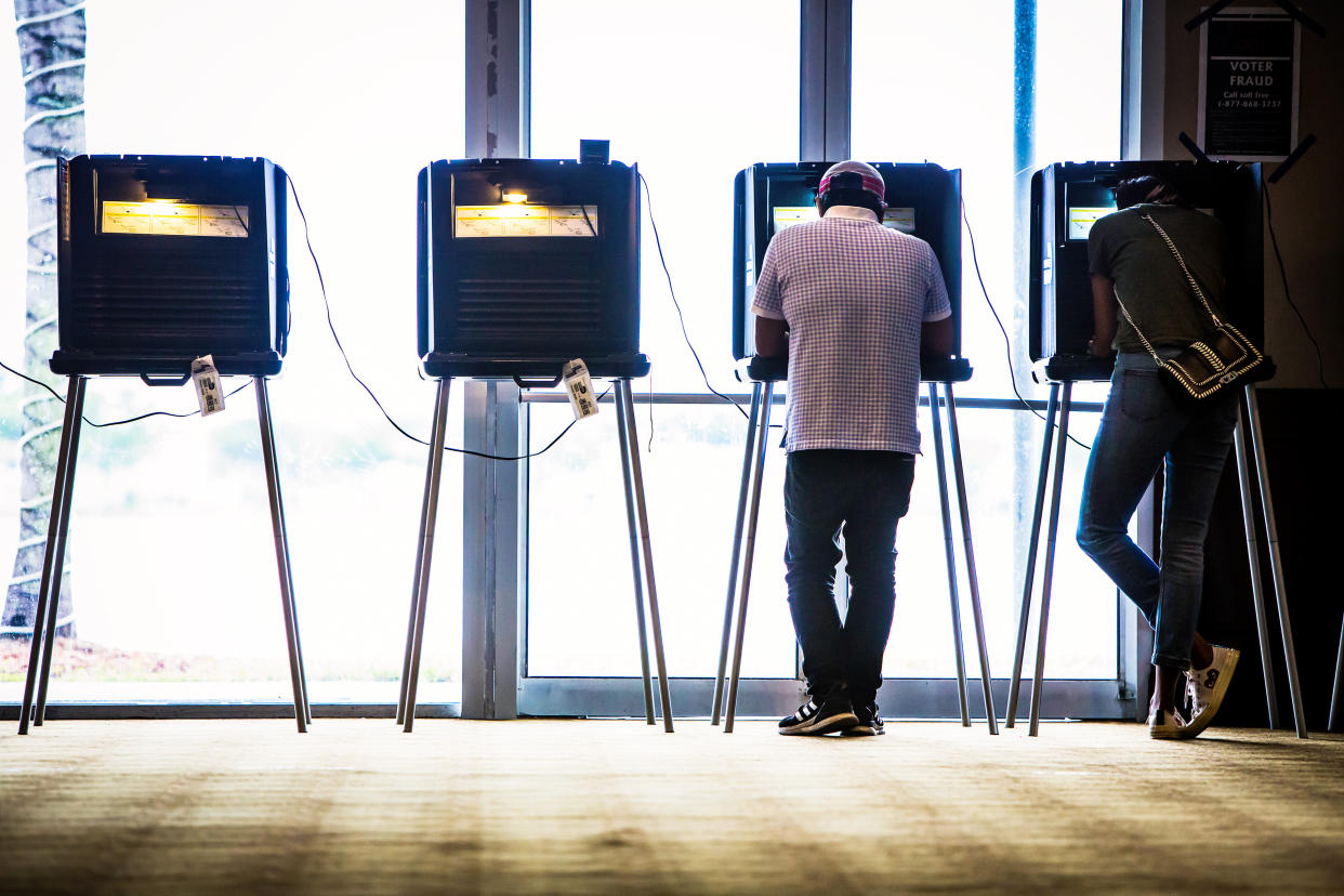 People casting ballots&nbsp;in the state&rsquo;s primary elections in Doral, Florida, in&nbsp;August. On&nbsp;Sept. 7, a U.S. district judge ordered&nbsp;32 of the state&rsquo;s 67 counties to provide election materials in Spanish for voters. (Photo: Bloomberg / Getty Images)