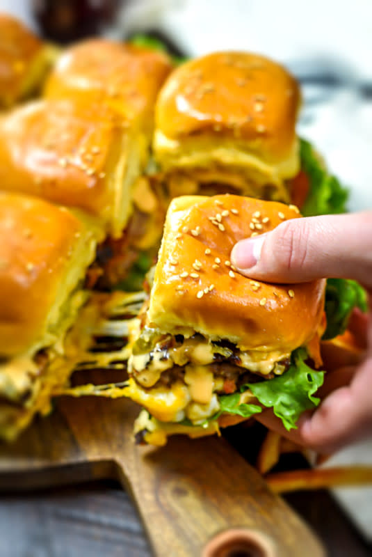 <p>Host the Toast</p><p>Stuffed with cheese, these loaded juicy sliders are perfect for snacking on.</p><p><strong>Get the recipe: <a href="https://hostthetoast.com/loaded-juicy-lucy-sheet-pan-sliders/" rel="nofollow noopener" target="_blank" data-ylk="slk:Loaded Juicy Lucy Sheet Pan Sliders;elm:context_link;itc:0;sec:content-canvas" class="link ">Loaded Juicy Lucy Sheet Pan Sliders</a></strong></p>