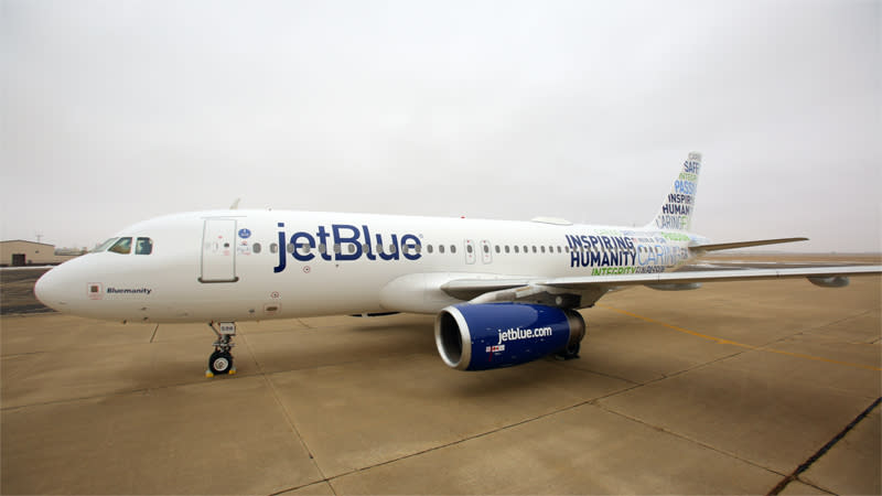 A JetBlue plane on the tarmac.