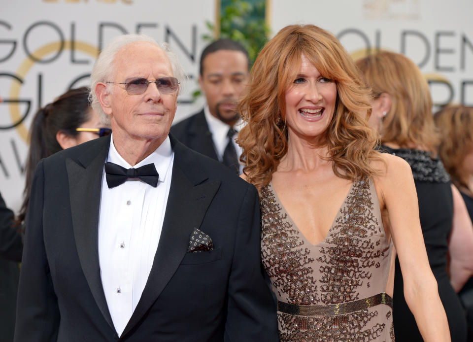 Bruce Dern, left, and Laura Dern arrive at the 71st annual Golden Globe Awards at the Beverly Hilton Hotel on Sunday, Jan. 12, 2014, in Beverly Hills, Calif. (Photo by John Shearer/Invision/AP)