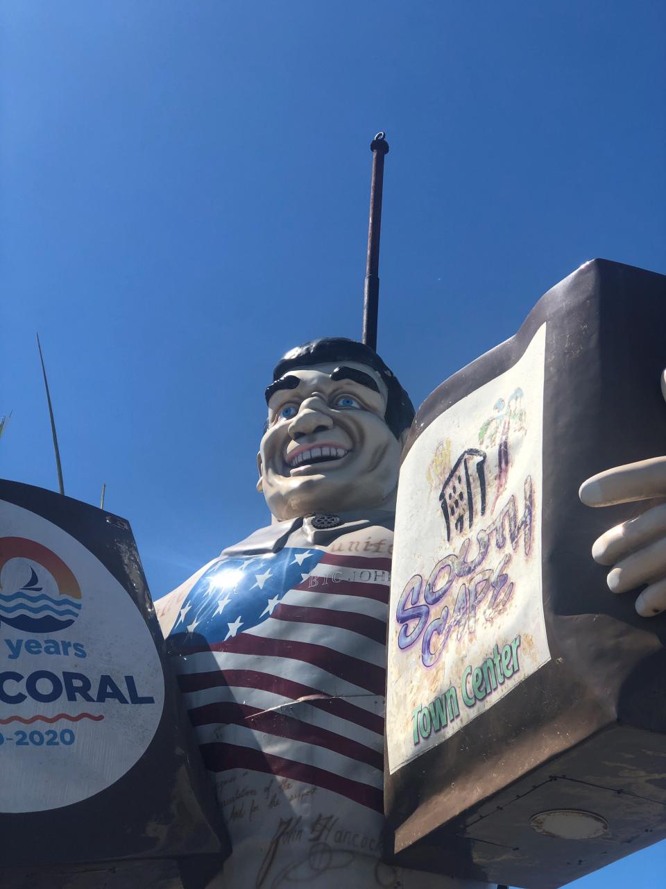 Cape Coral's popular Big John statue was damaged during Hurricane Ian. The storm's winds twisted its torso and broke it free of its metal support structure. Now a metal pole juts from Big John's head.