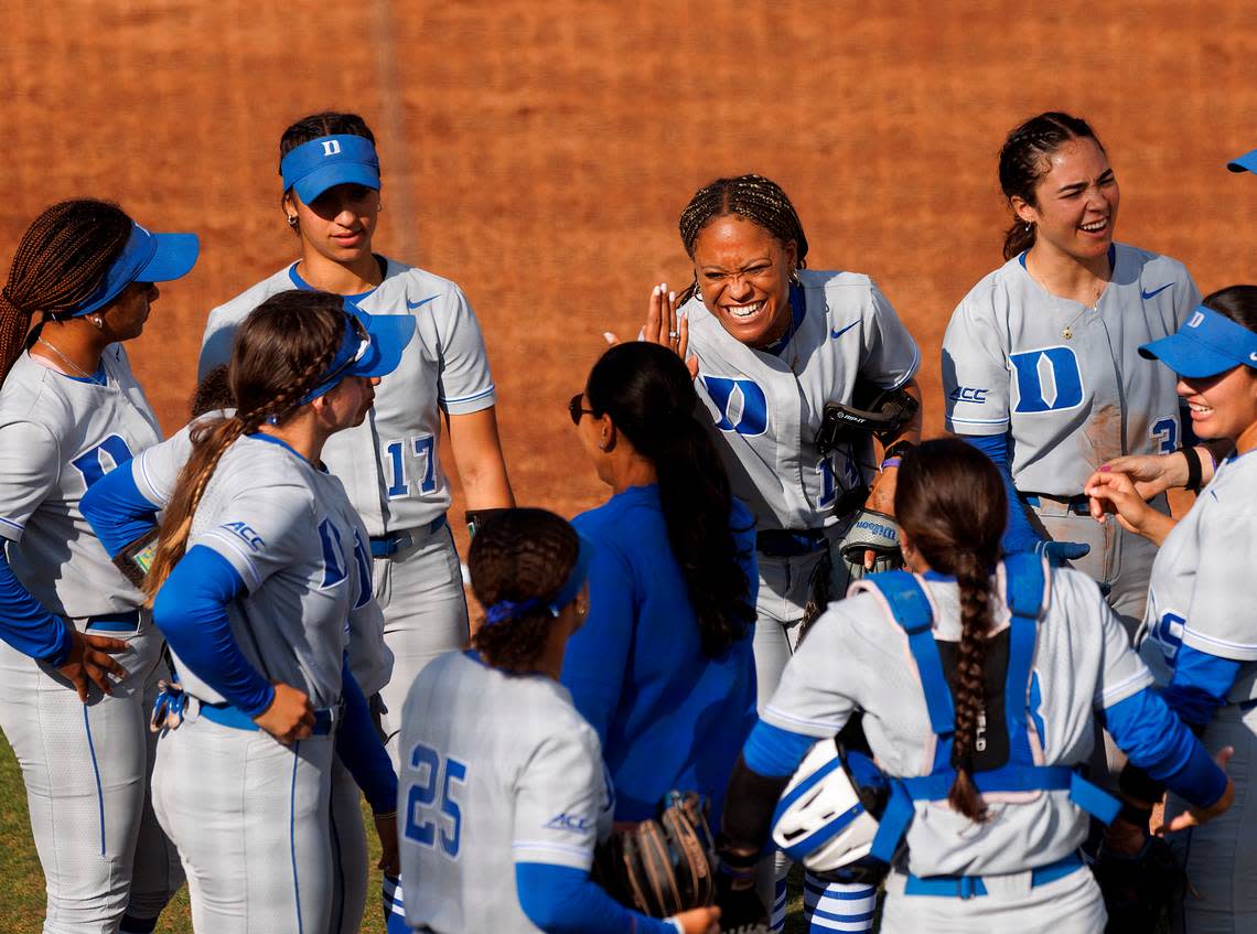 Duke’s Jala Wright, center, high fives head coach Marissa Young during the Blue Devils’ 6-0 win over Longwood on Wednesday, April 24, 2024, in Durham, N.C. Kaitlin McKeown/kmckeown@newsobserver.com
