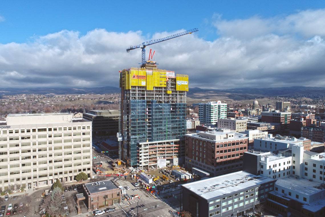 The 26-story 12th and Idaho building, recently named The Arthur, finished vertical construction in early February and is slated to open in early 2025. The Idaho Power building is to its immediate left. The state Capitol is in the background at right. Courtesy of Oppenheimer Development Corp.