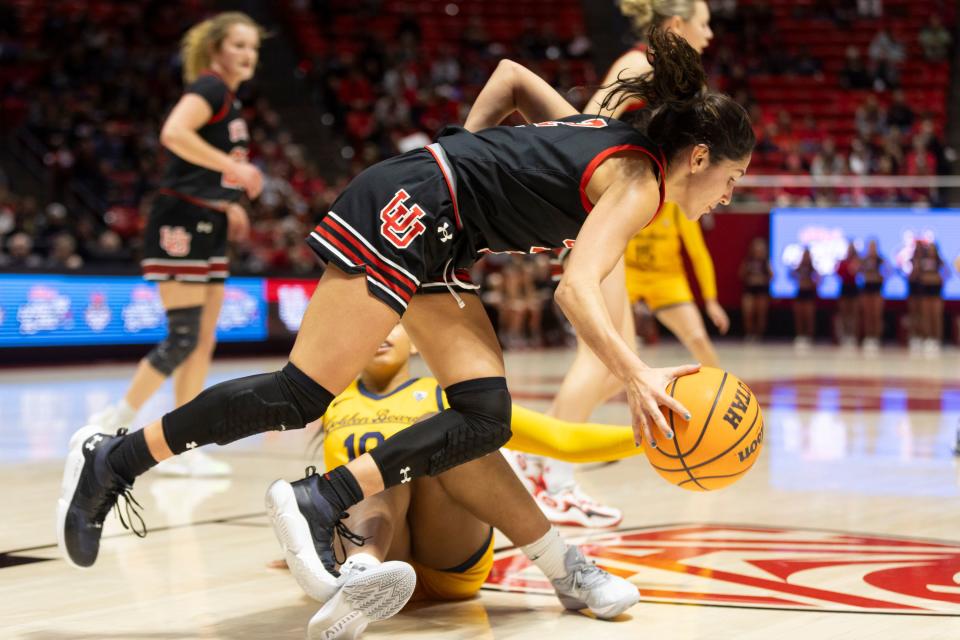 Utah Utes guard Inês Vieira (2) retrieves the ball against University of California’s guard Lulu Twidale (10) at University of Utah’s Huntsman Center in Salt Lake City on Jan. 14, 2024. University of Utah won 93-56. | Marielle Scott, Deseret News