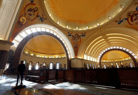 A worker cleans the interior of the new Coptic Cathedral of the Nativity at the New Administrative Capital (NAC) east of Cairo, Egypt January 3, 2019. Picture taken January 3, 2019. REUTERS/Amr Abdallah Dalsh