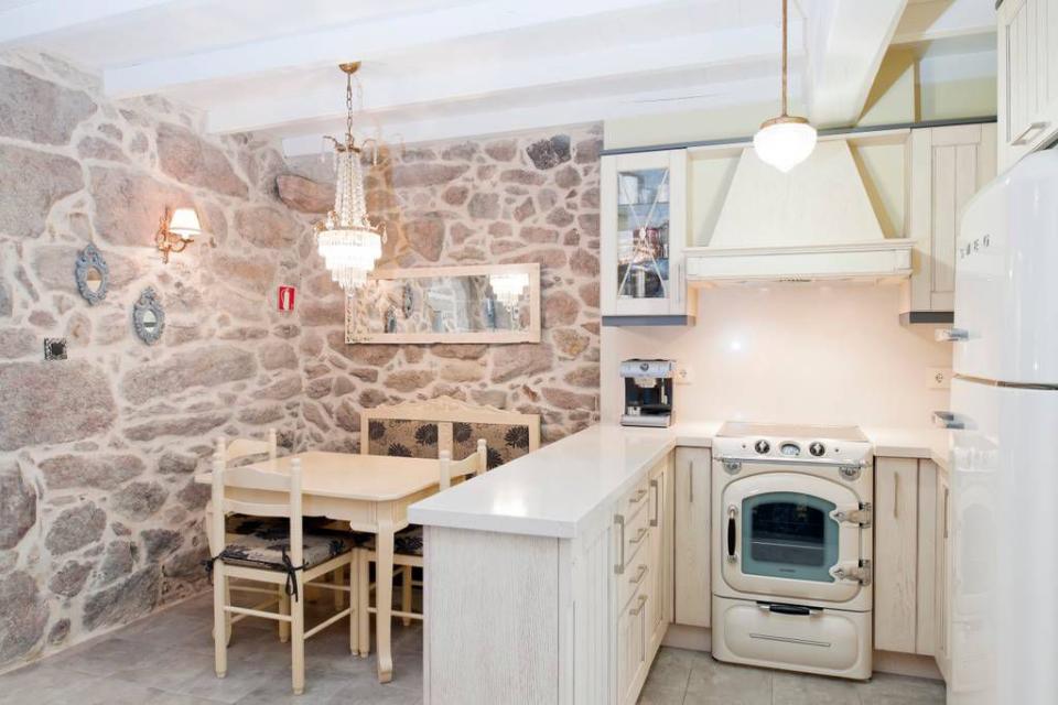 4) The home has the cutest white kitchen.