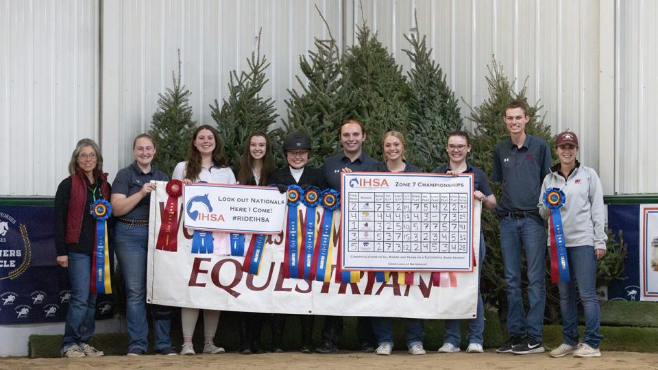 West Texas A&M University hunt seat team members are, from left, Katrina Taylor, Miranda Whitten, Eva Severance, Ashley Polson, Kristina Todd, Marty Kacsh, Johanna Anderson, Alexandria Woestman and Ryan Wight. Also pictured is co-coach Julia Bastian, right.