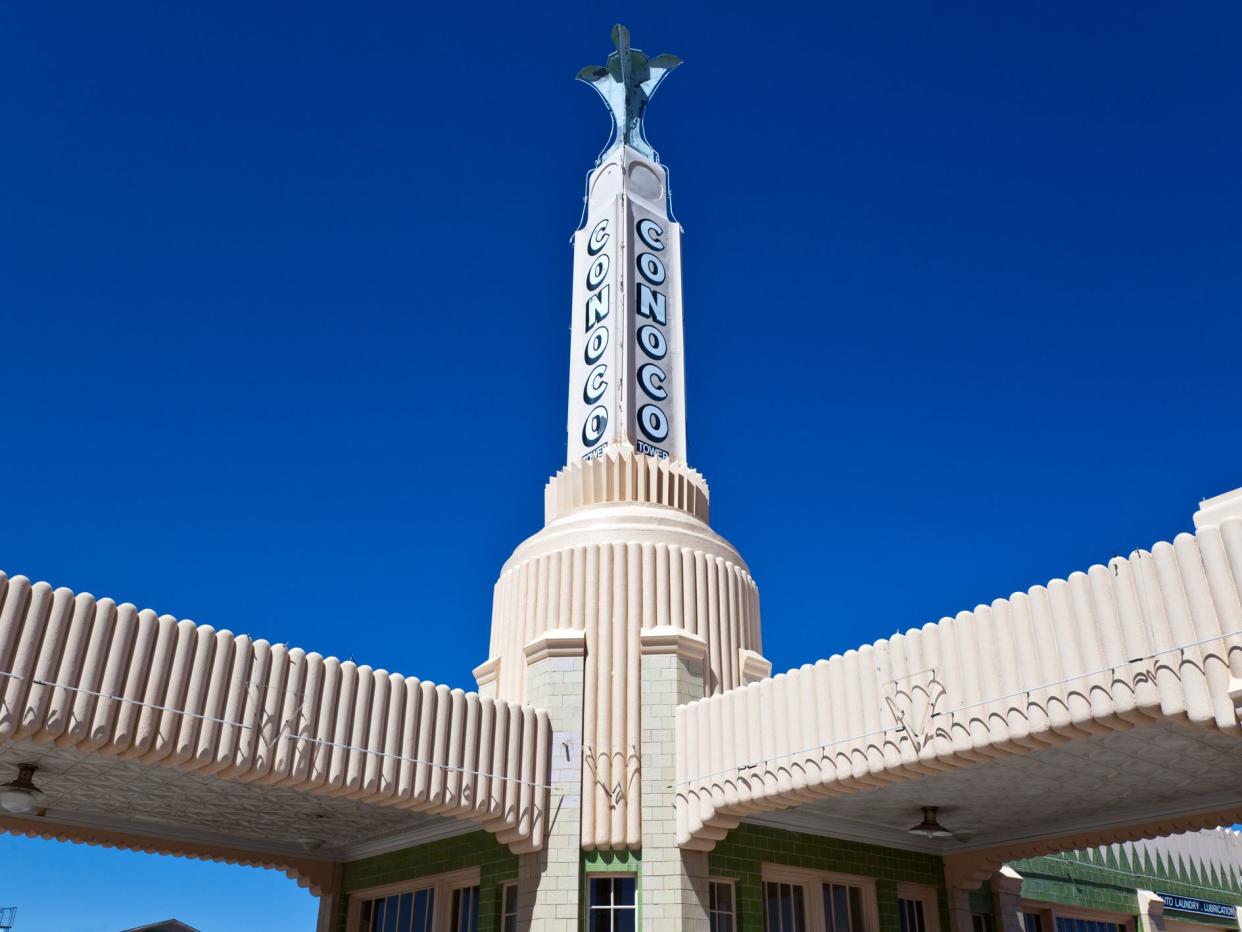 "Shamrock, USA - May 20, 2011: The tower of the well restored Magnolia service station of the sixties, along the Route 66, Texas."