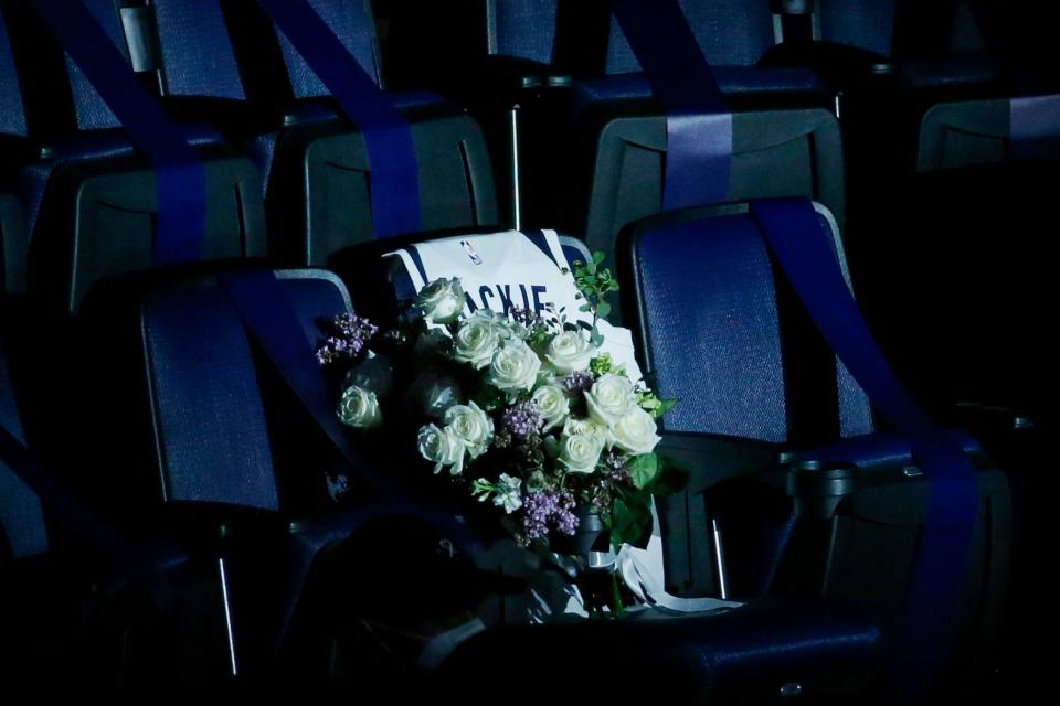 A seat was reserved and adorned with flowers and a jersey for Jacqueline Cruz during the Timberwolves game against the Bulls on April 11. Cruz died in April 2020 of COVID-19.