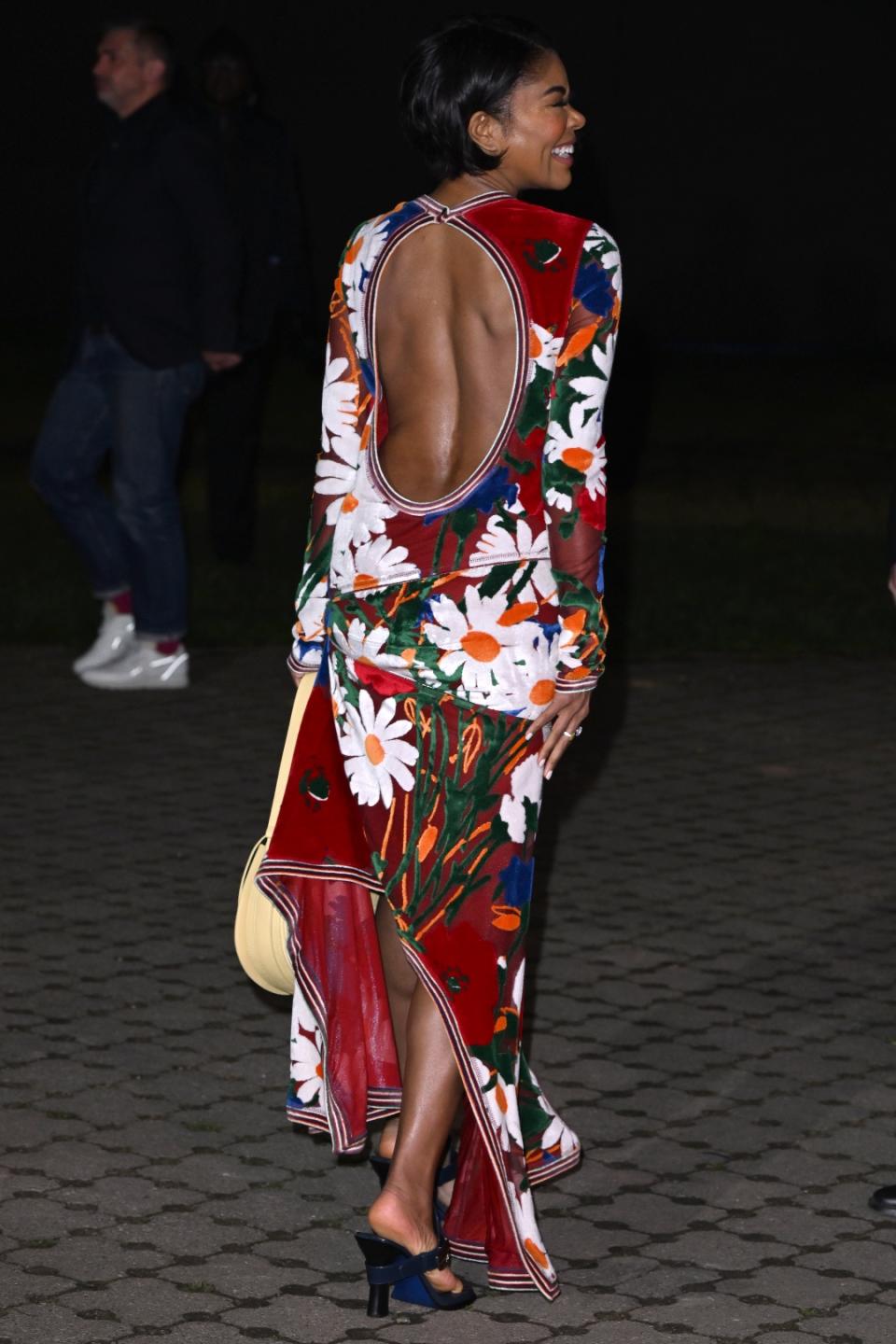 Gabrielle Union Burberry show backless floral dress thong straps heels sandals yellow saddle handbag London Fashion Week