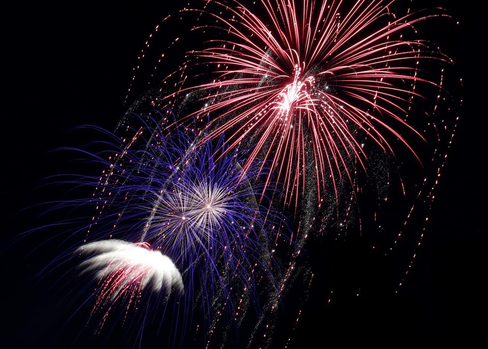 Colors fill the night sky during the annual Festival Foods Fireworks at Memorial Park in Appleton.