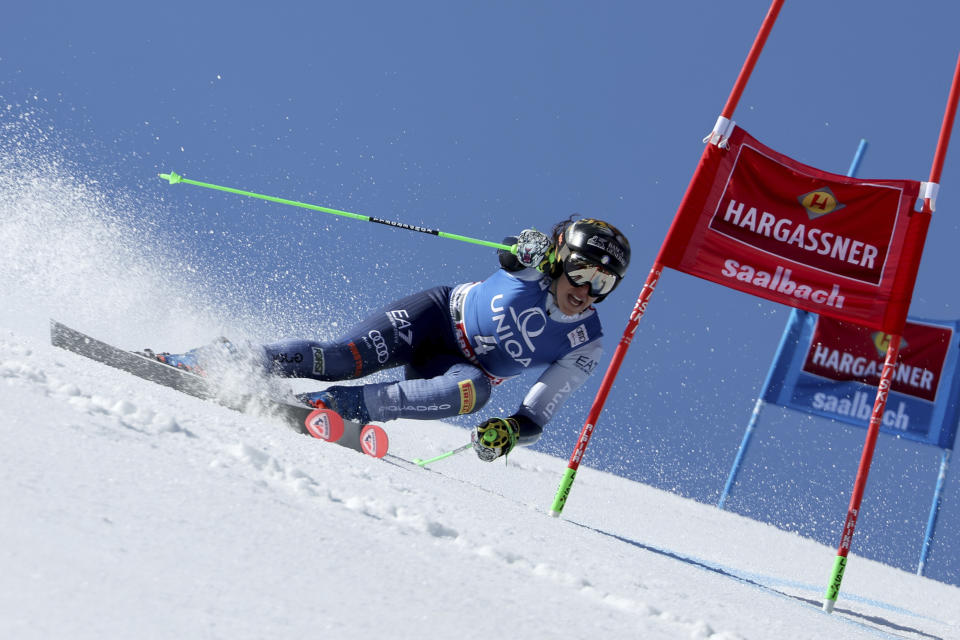 Italy's Federica Brignone competes during the first run of an alpine ski, women's World Cup giant slalom race, in Saalbach, Austria, Sunday, March 17, 2024. (AP Photo/Marco Trovati)