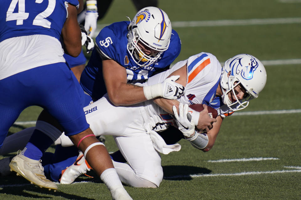 San Jose State defensive lineman Cade Hall (92) sacks Boise State quarterback Hank Bachmeier (19) during the first half of an NCAA college football game for the Mountain West championship, Saturday, Dec. 19, 2020, in Las Vegas. (AP Photo/John Locher)