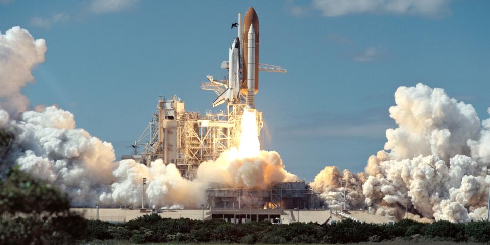 The space shuttle is seen lifting off in the 90s.