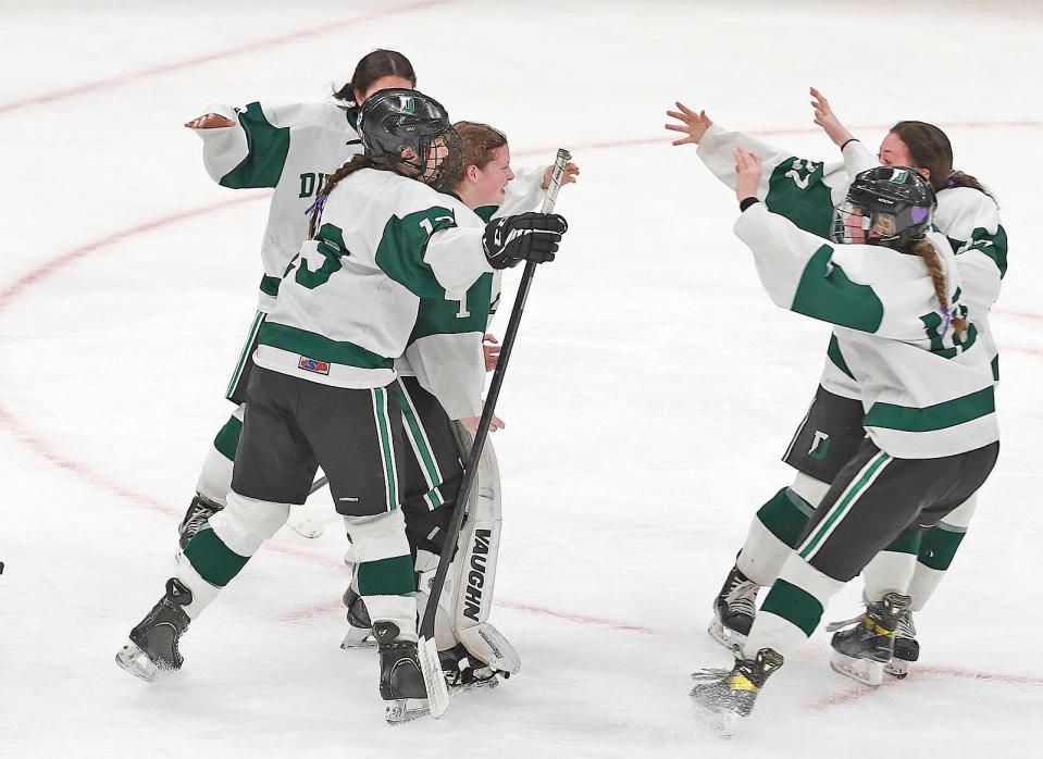 Duxbury players start celebrating at the final buzzer.The Duxbury High girls hockey team won the Division 2 state championship at TD Garden after defeating Canton on Sunday March 19, 2023 