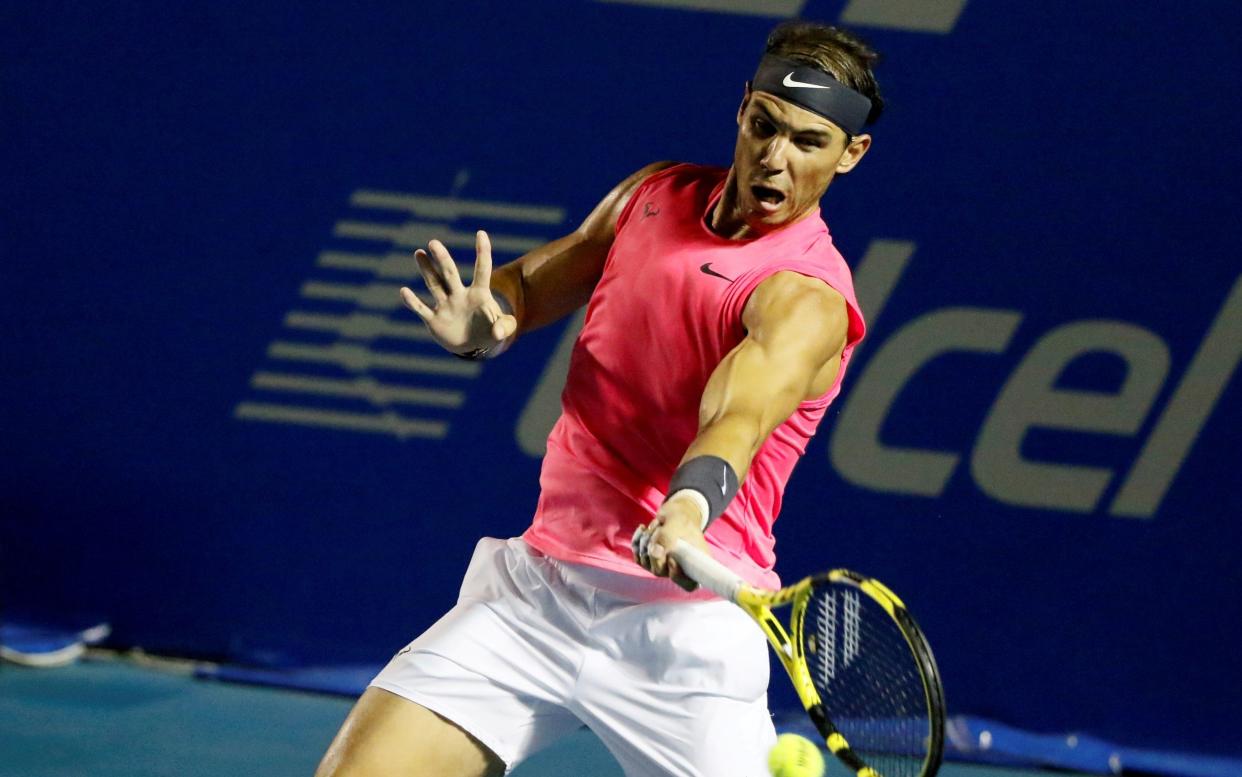 Rafael Nadal hitting a forehand - Rafael Nadal pulls out of US Open over coronavirus fears - REUTERS
