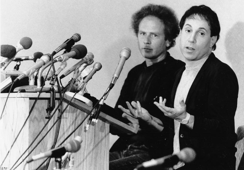 Art Garfunkel and Paul Simon hold a news conference July 19, 1983, at the Quaker Square Hilton as they prepare to kick off their national tour in Akron.