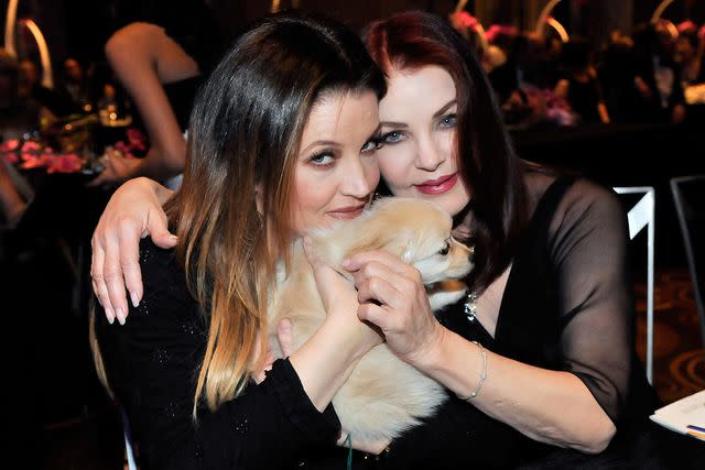 <p>David Becker/WireImage</p> Priscilla and Lisa Marie Presley pose for a photo at the Aria Resort & Casino at CityCenter in 2011