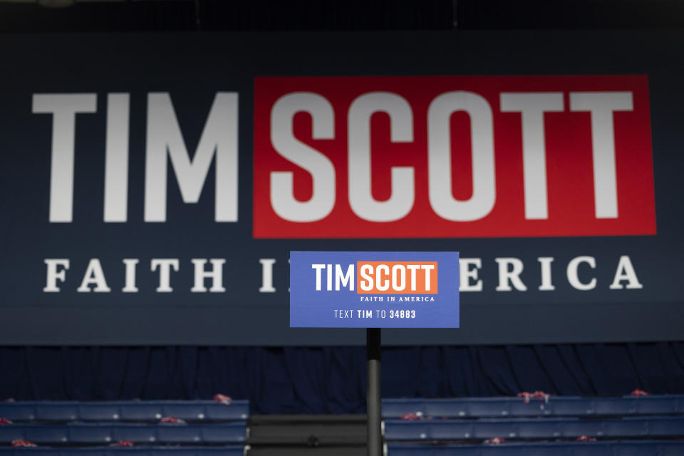 An empty gym stage waits for Republican presidential candidate Tim Scott to deliver his speech announcing his candidacy for president of the United States on the campus of Charleston Southern University in North Charleston, S.C., Monday, May 22, 2023. (AP Photo/Mic Smith)