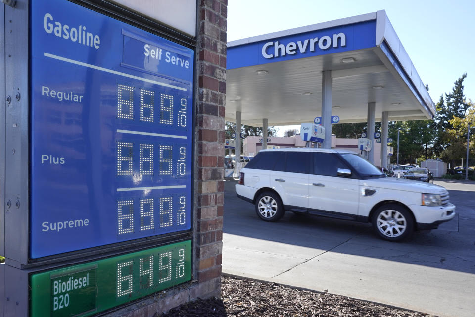 Gasoline prices are displayed at a gas station in Sacramento, Calif., Friday, Sept. 30, 2022. On Friday, Gov. Gavin Newsom announced that oil refineries could start selling more polluting winter-blend gasoline ahead of schedule to ease soaring fuel prices, directly contradicting his own goals for reducing climate emissions. (AP Photo/Rich Pedroncelli)