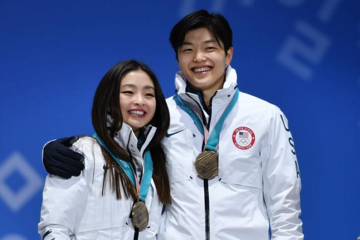USA&#39;s bronze medallists Maia Shibutani and Alex Shibutani on the podium during the medal ceremony for the figure skating ice dance at Pyeongchang 2018 Winter Olympic Games.