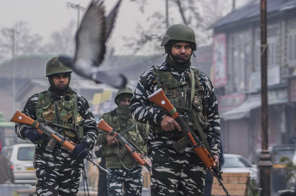 Indian paramilitary soldiers patrol at the main market in Srinagar, Indian controlled Kashmir, Monday, Dec. 11, 2023. India’s top court on Monday upheld a 2019 decision by Prime Minister Narendra Modi’s government to strip disputed Jammu and Kashmir’s special status as a semi-autonomous region with a separate constitution and inherited protections on land and jobs. (AP Photo/Mukhtar Khan)