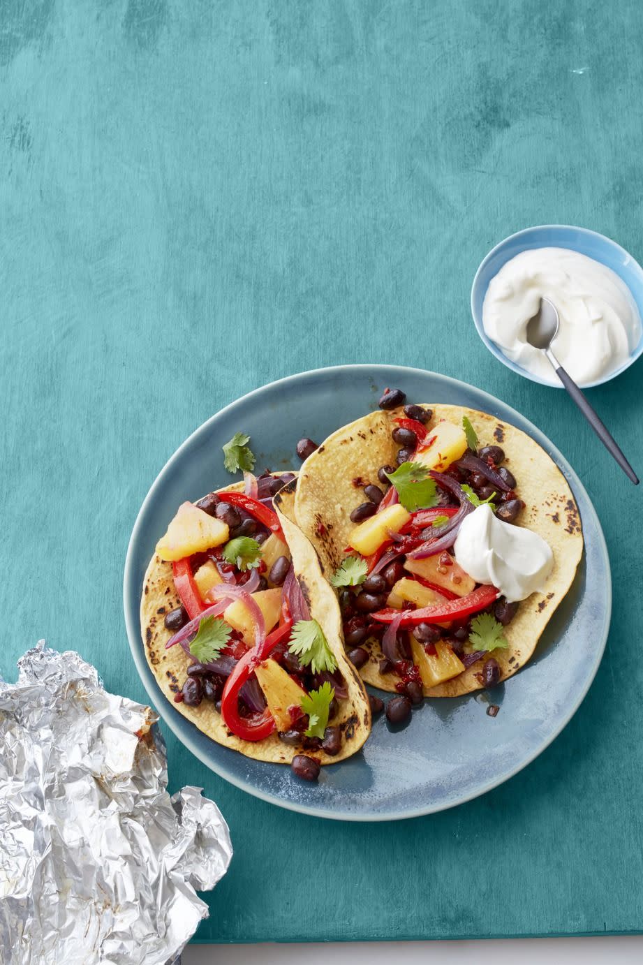 <p>Mexican goes meatless with these sweet and smoky vegetarian fajitas.</p><p><em><a href="https://www.womansday.com/food-recipes/food-drinks/recipes/a55764/pineapple-and-black-bean-fajitas-recipe/" rel="nofollow noopener" target="_blank" data-ylk="slk:Get the Pineapple and Black Bean Fajitas recipe.;elm:context_link;itc:0;sec:content-canvas" class="link ">Get the Pineapple and Black Bean Fajitas recipe.</a></em></p>