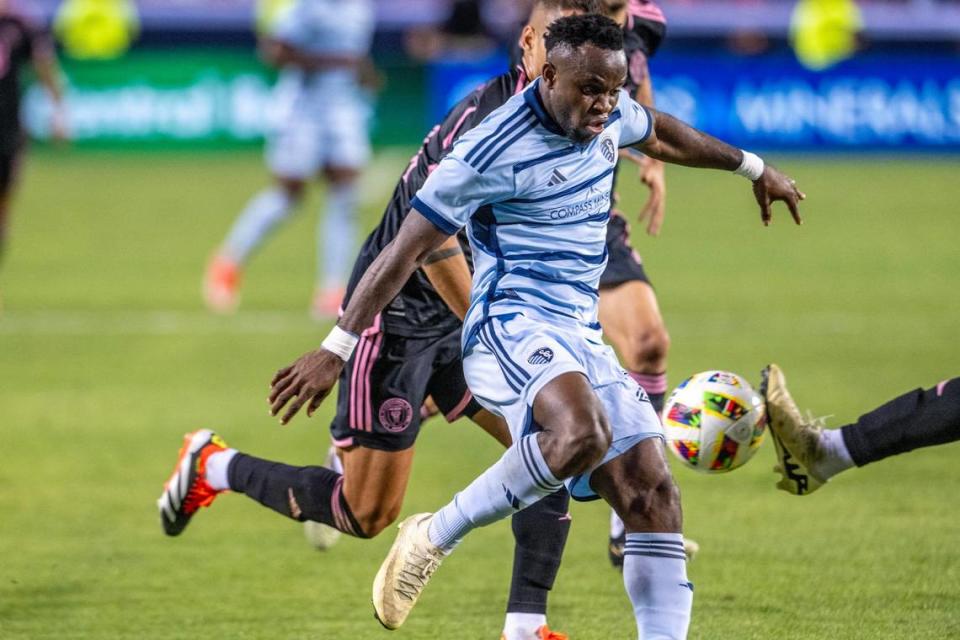 Sporting Kansas City forward Willy Agada (23) is blocked by Inter Miami defenders in the second half during an MLS game at GEHA Field at Arrowhead Stadium on Saturday, April 13, 2024, in Kansas City.