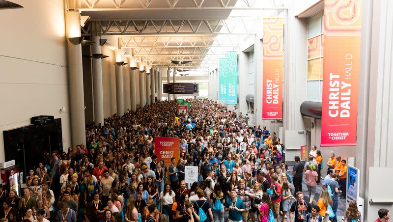 Attendees file out after Relief Society General President Camille N. Johnson’s keynote address at the Gather Together Conference, part of the Utah Area YSA Conference, at the Salt Palace Convention Center in Salt Lake City on Saturday, Aug. 19, 2023.