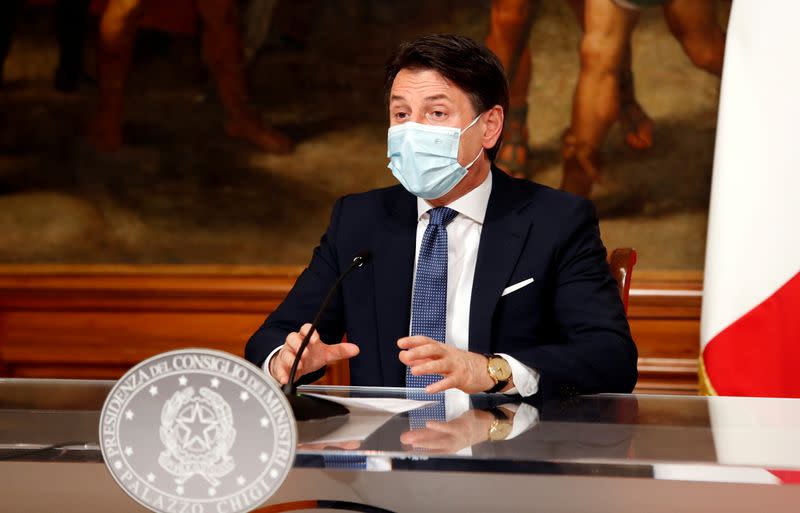 FILE PHOTO: ItalianPrime Minister Giuseppe Conte speaks at a news conference