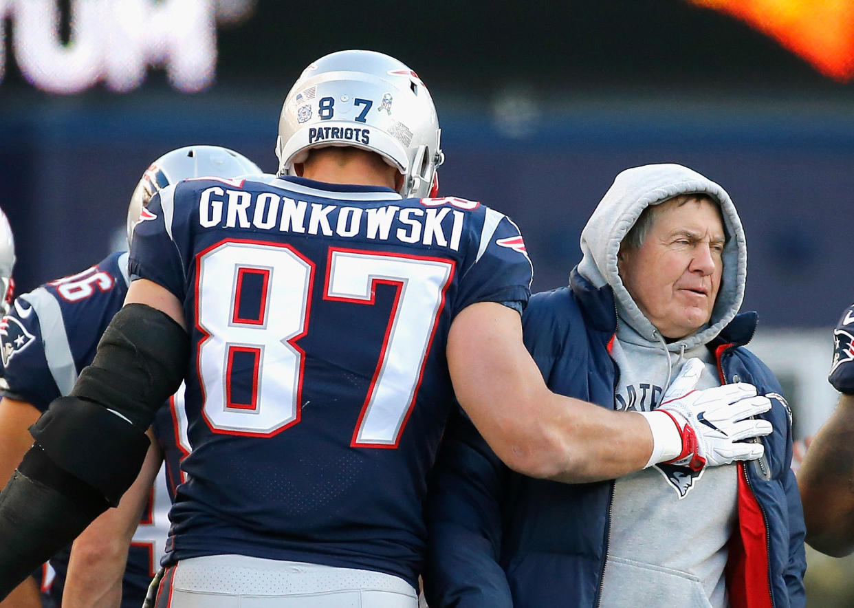 FOXBORO, MA - NOVEMBER 26:  Rob Gronkowski #87 of the New England Patriots reacts with head coach Bill Belichick after catching a touchdown pass during the third quarter of a game against the Miami Dolphins at Gillette Stadium on November 26, 2017 in Foxboro, Massachusetts.  (Photo by Jim Rogash/Getty Images)