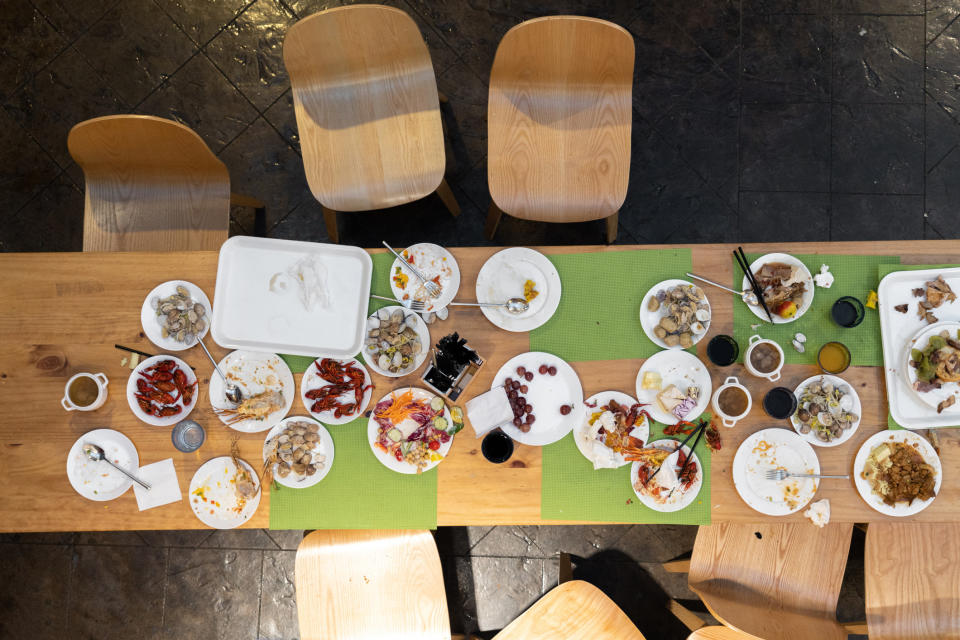 an uncleared table at a restaurant