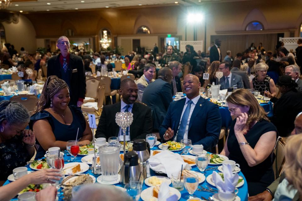 Maryland Governor Wes Moore enjoys dinner with friends and family at the Maryland Democratic Party Gala 2024 fundraiser at Martin’s Crosswinds in Greenbelt, MD, on Thursday, June 20, 2024.