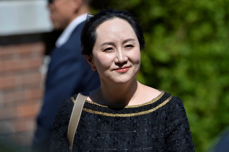 FILE PHOTO: Huawei Technologies Chief Financial Officer Meng Wanzhou leaves her home to attend a court hearing in Vancouver