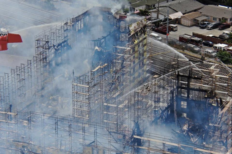 Pictures showed the large structure gutted and smoking, as fire crews remained on the scene (San Mateo County Sheriff’s Office)