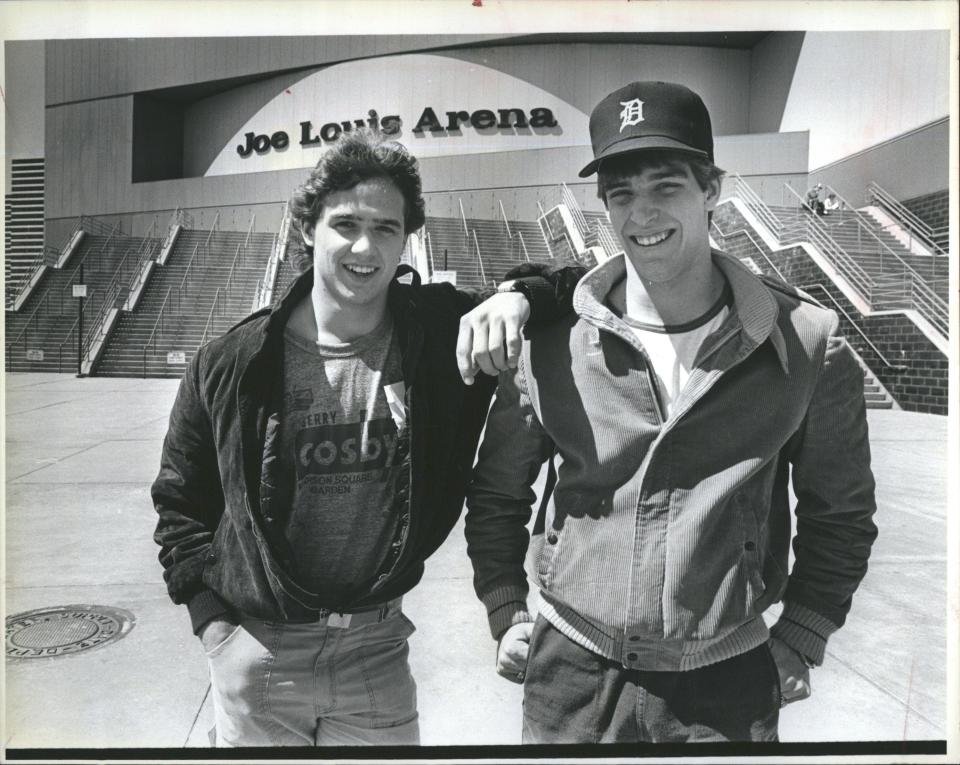 Former Detroit Red Wings teammates Steve Yzerman and Lane Lambert stand in front of the Joe Louis Arena in 1984.