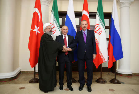 Presidents Tayyip Erdogan of Turkey, Vladimir Putin of Russia and Hassan Rouhani of Iran meet in Sochi, Russia, November 22, 2017. Kayhan Ozer/Turkish Presidential Palace/Handout via REUTERS