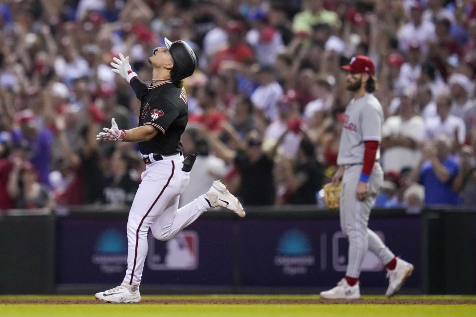 Arizona Diamondbacks' Alek Thomas rounds the bases after a two-run home run against the Philadelphia Phillies during the eighth inning in Game 4 of the baseball NL Championship Series in Phoenix, Friday, Oct. 20, 2023. (AP Photo/Ross D. Franklin)