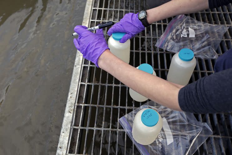 An EPA contractor labels water samples