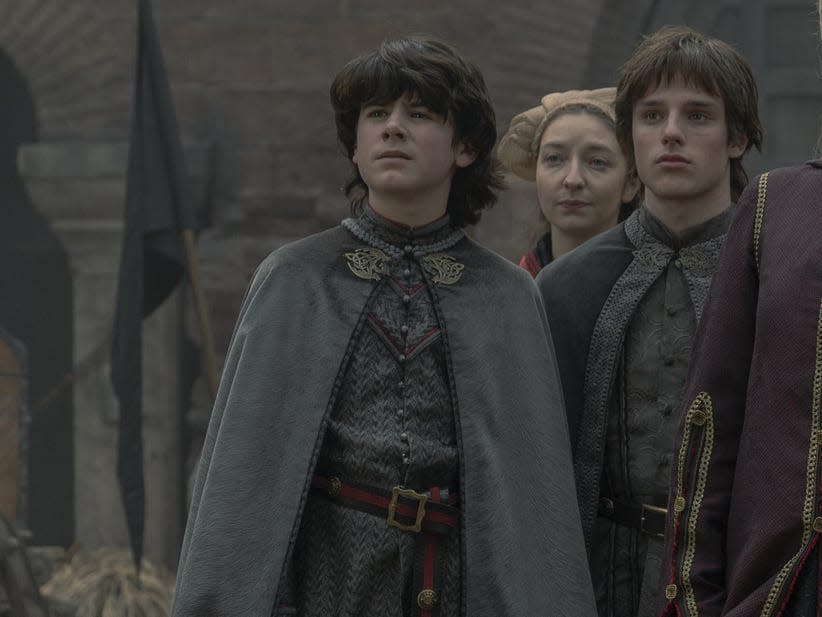 House Targaryen standing in a group in the castle courtyard.