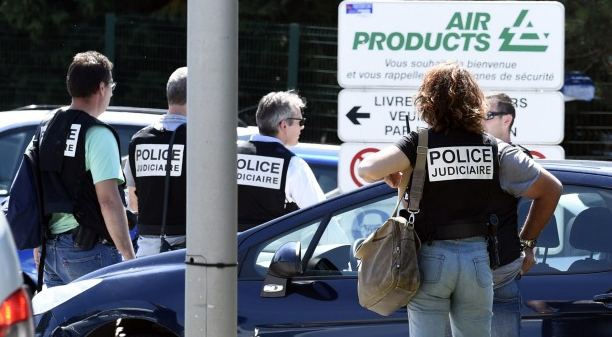 French police secure the entrance of the Air Products factory in Saint-Quentin-Fallavier. Photo: AP