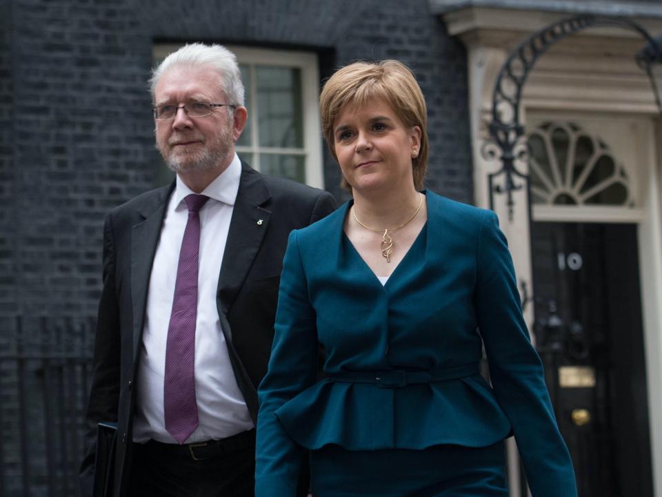 Scotland’s constitution secretary Michael Russell with Nicola SturgeonPA