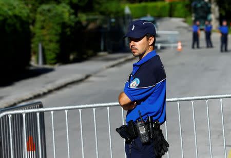 A police officer looks on ahead of peace talks on divided Cyprus under the supervision of the United Nations in the alpine resort of Crans-Montana, Switzerland June 28, 2017. REUTERS/Denis Balibouse