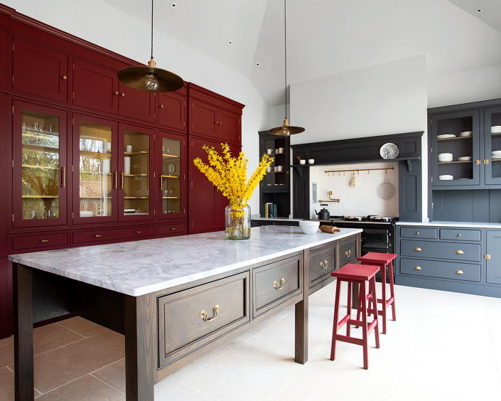 <p> Our love affair with dramatic dark kitchen cabinet ideas is far from over but this year things are warming up. Move over blacks, deep blues and greens, because rich red kitchen ideas are radiating their way into the heart of the home. </p> <p> Pure primary reds are still a bit 1990s; instead, this trend steers us towards muddier tones with tints of nature-led orange and brown. &apos;Perhaps it&apos;s a yearning for the light and warmth of Southern climes that&apos;s behind the current demands for reds, burgundies and terracottas,&apos; suggests Merlin Wright, design director at Plain English. &apos;Warm colors are positive and inspiring and complement other Mediterranean hues such as blues, greens and yellows. Experiment with different tones to suit the light and scale of your room.&apos; </p> <p> &apos;Reds and burgundies are rich, traditional shades that lend character and coziness,&apos; says Jasper Middleton, design director, Middleton. &apos;Soften strong tones on floor-to-ceiling cabinetry with glazed sections that reveal mellow, yellow interiors.&apos; </p>
