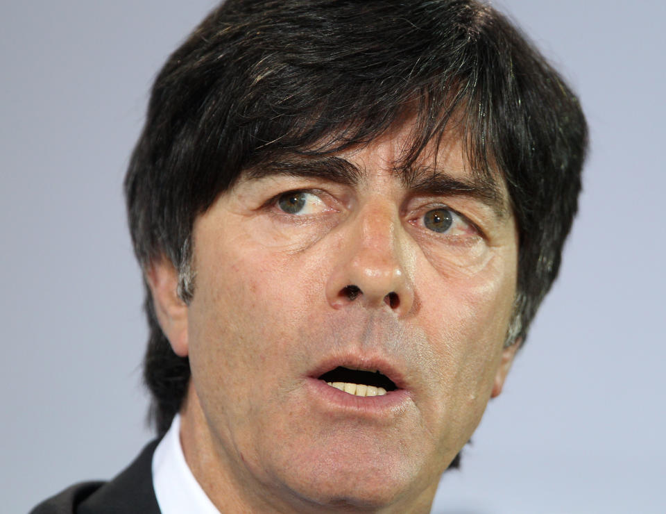 Coach of German national soccer team, Joachim Loew, presents his team for the Euro 2012 in Poland and Ukraine during a press conference in Rastatt, Germany, Monday, May 7, 2012. (AP Photo/Michael Probst)