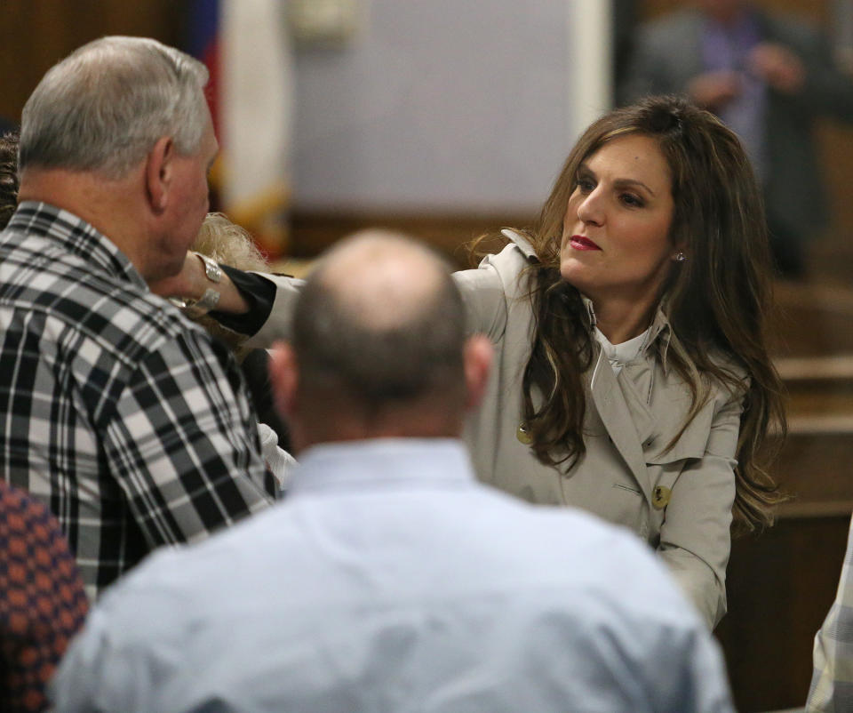 Chris Kyle's widow, Taya Kyle, hugs supporters before court is in session during the capital murder trial of former Marine Cpl. Eddie Ray Routh at the Erath County, Donald R. Jones Justice Center on Feb. 12, 2015 in Stephenville, Texas. Routh, 27, of Lancaster, is charged with the 2013 deaths of former Navy SEAL Chris Kyle and his friend Chad Littlefield at a shooting range near Glen Rose, Texas. (Paul Moseley/Fort Worth Star-Telegram/TNS via Getty Images)