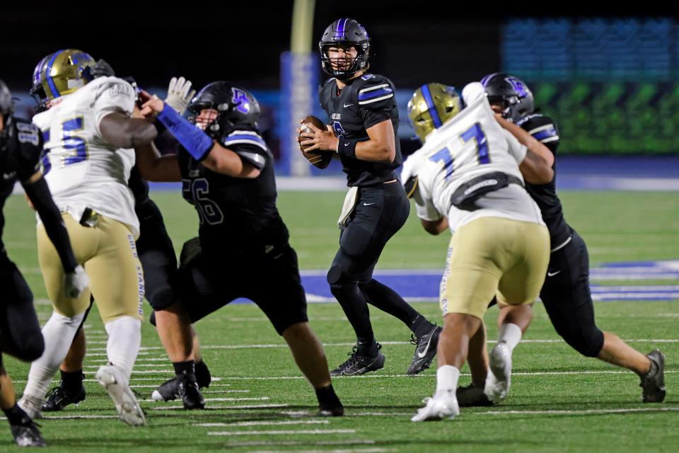 Deer Creek quarterback Grady Adamson (6) looks for a receiver against Choctaw furing a high school football game at Deer Creek High School in Edmond, Okla., Friday, Oct. 6, 2023.