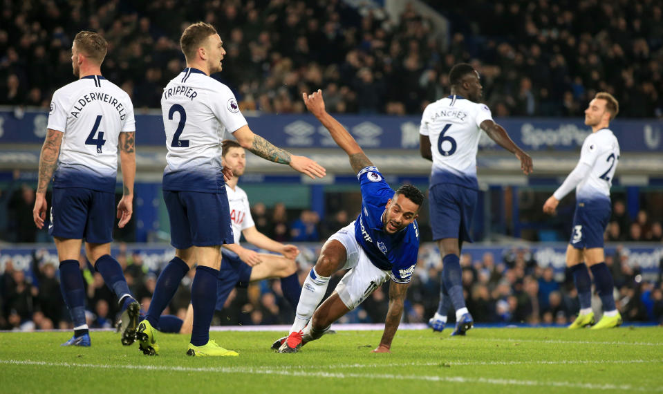 Everton’s Theo Walcott wheels away after opening the scoring at Goodison Park